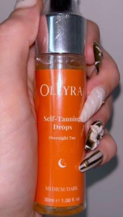 Customer photo of an Oleyra tanning drops bottle